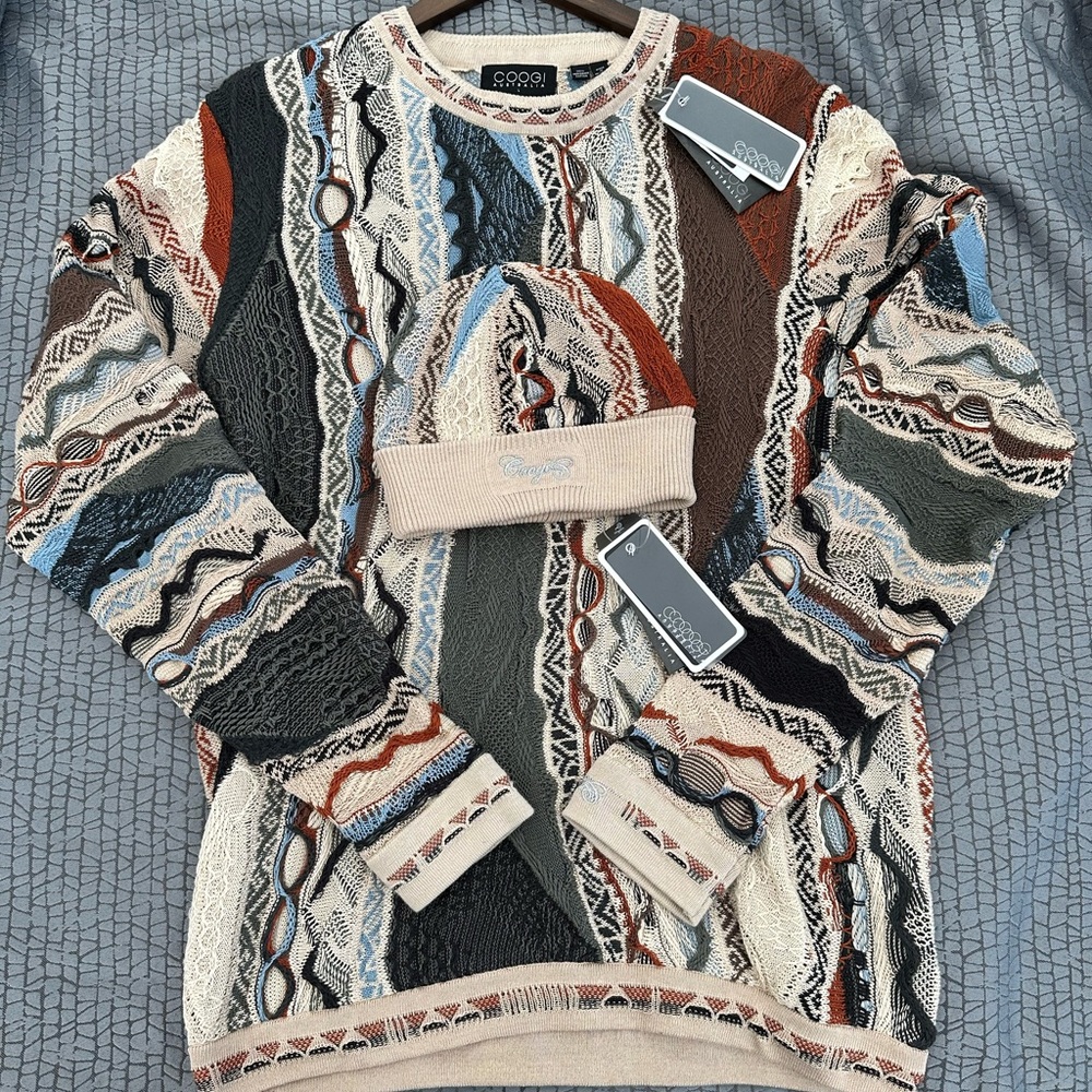 Brand new men’s coogi sweater with matching hat! Mens Large